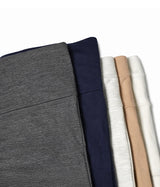 Stack of fabric swatches in various colors on a white background. High Waist Capri Leggings (Tight)